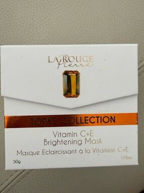 La rouge Topaz Collection Vitamin C+E Brightening Mask in gold and white